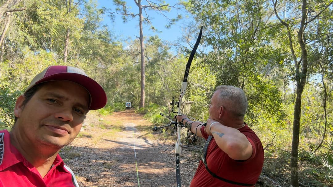 Archery target with arrows